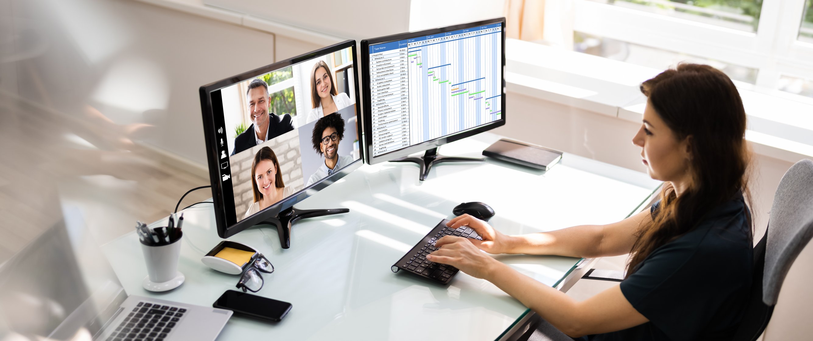 Woman participating on a team call from home office